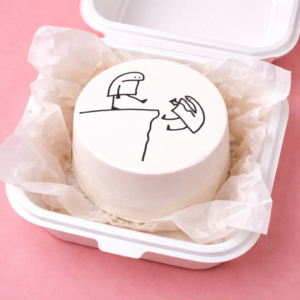 Pushing Doodle Off The Cliff Bento Cake